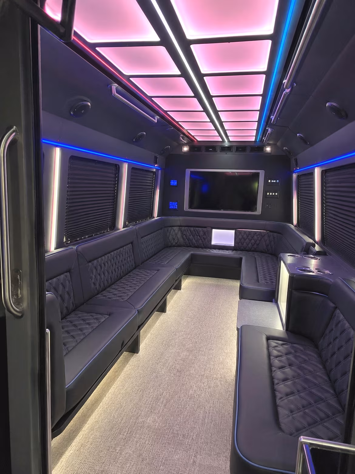 Group beside a Mercedes Sprinter limo in Chandler