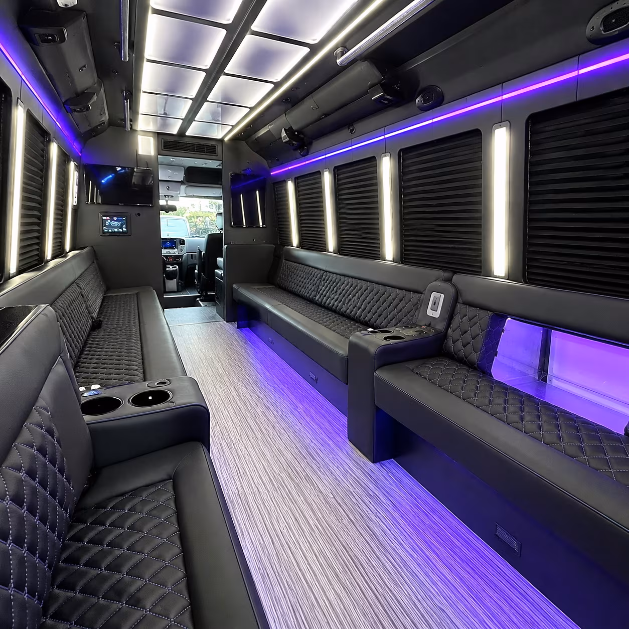 Wedding guests seated inside a party bus serving Chandler